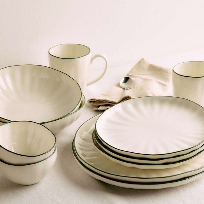 Lotus Dinner Plate - White/Green, stacked white dinnerware plates with green rims, styled with matching bowls and mugs