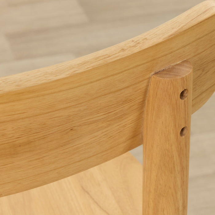 Maeve Dining Chair - Natural, close-up of solid wood curved backrest and rear leg joinery in natural finish