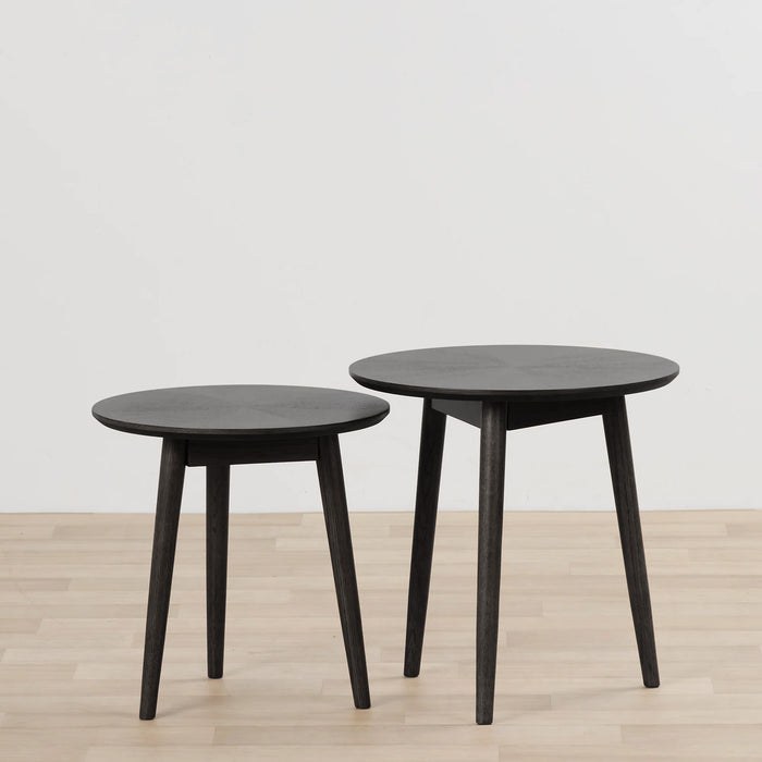 Orlando Small Side Table - Black, round black side table with tapered legs, paired with a larger matching table on timber flooring