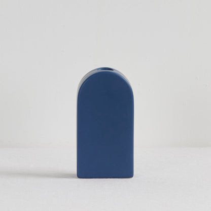 Arch Vase - Blue, sculptural blue ceramic vase with a curved arch silhouette and narrow top opening