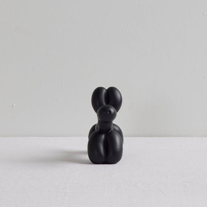Balloon Dog Object - Black decorative balloon animal sculpture with a sleek black finish on a white surface