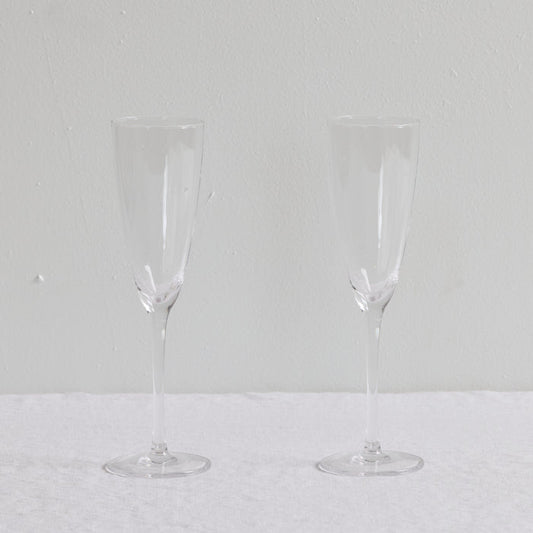 Bravo Champagne Glass Set - 2pc - Clear, two clear champagne flutes with sleek refined silhouettes.