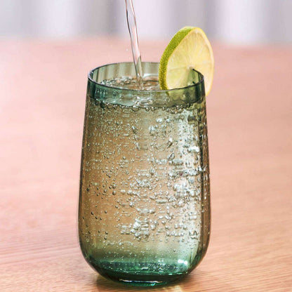 Bravo Tall Tumbler Set - 2pc - Green, soft green glass tumbler filled with sparkling water and garnished with lime.