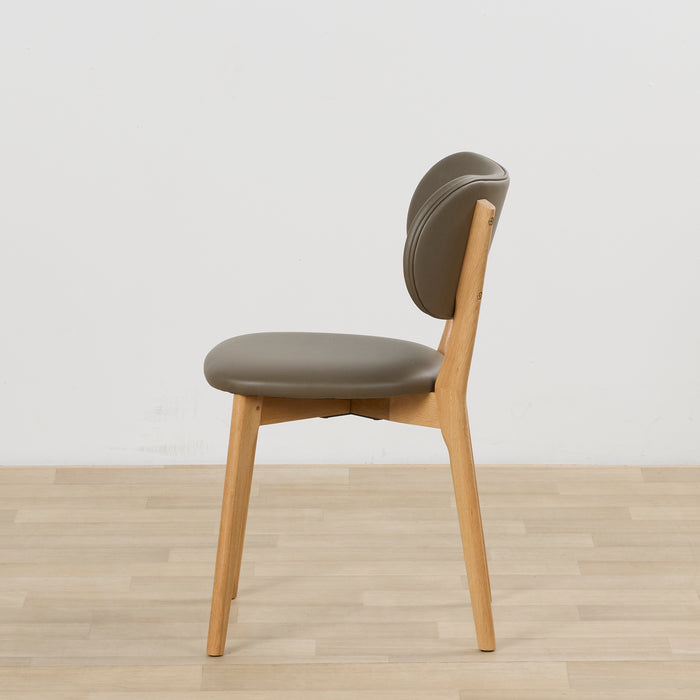 Briar Dining Chair - Oak/Olive, side view of olive upholstered dining chair with warm oak-toned timber frame and curved backrest