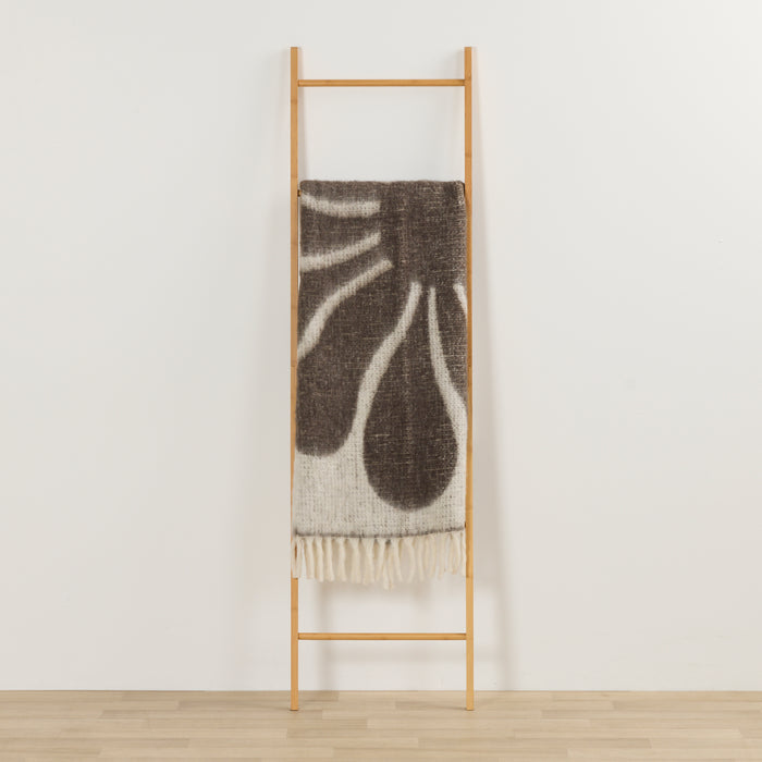 Happy Throw - Brown/White, thick patterned throw with fringe draped over a timber ladder.