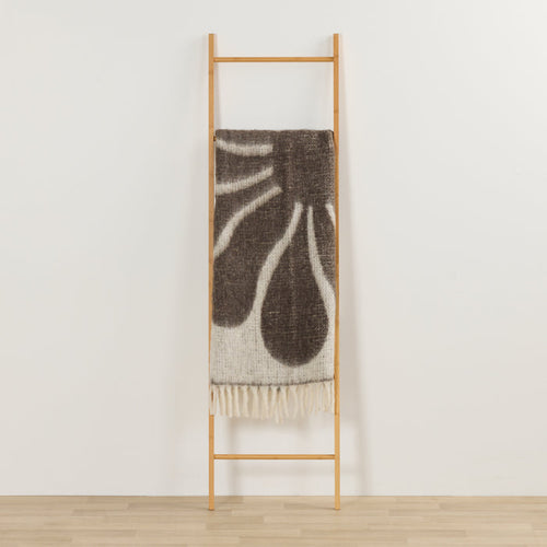 Happy Throw - Brown/White, thick patterned throw with fringe draped over a timber ladder.