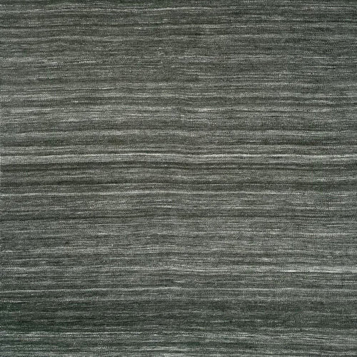 A close-up of a textured woven rug or fabric in dark charcoal gray with subtle horizontal tonal variation and white fringe along the top and bottom edges.