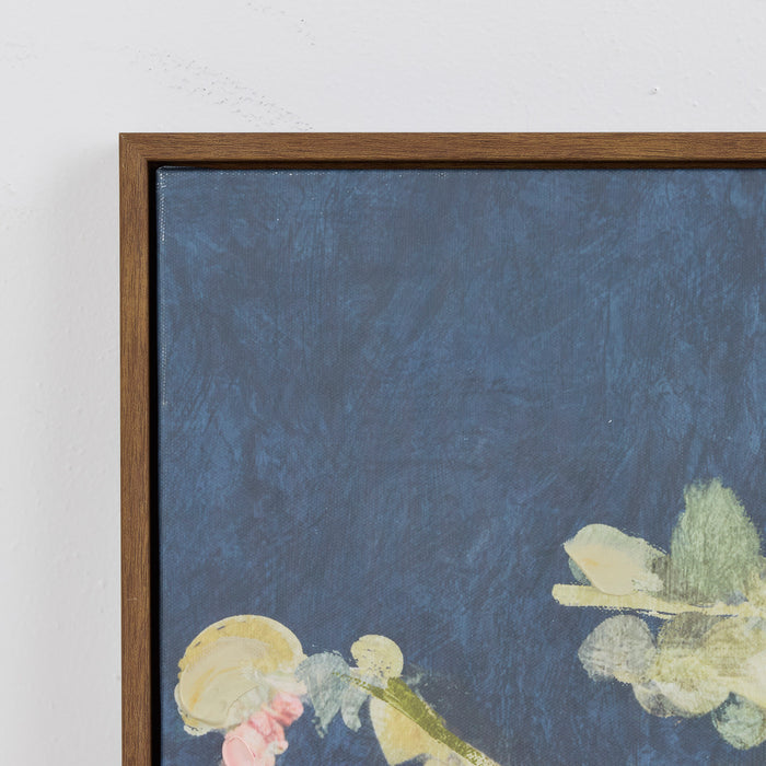 Framed artwork with abstract design on a blue background