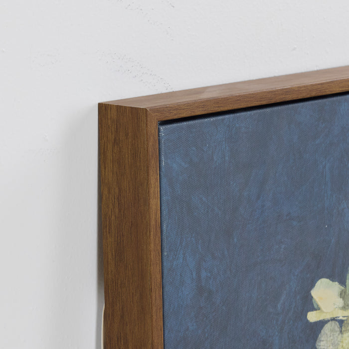 Close-up of a wooden frame with a textured blue background