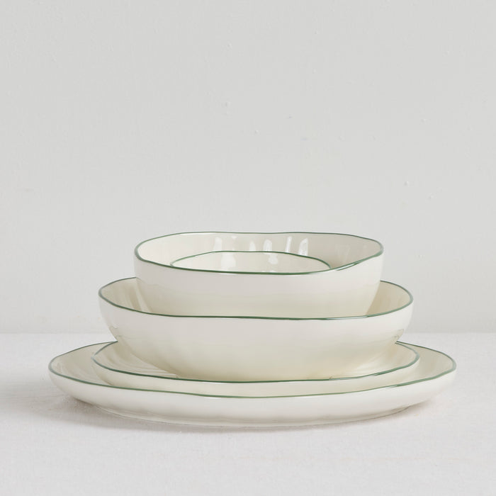 Lotus Dinner Plate - White/Green, white dinnerware plate with fine green rim, styled with matching bowl and side plate
