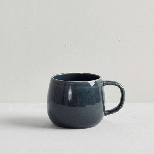 Blue glazed ceramic mug