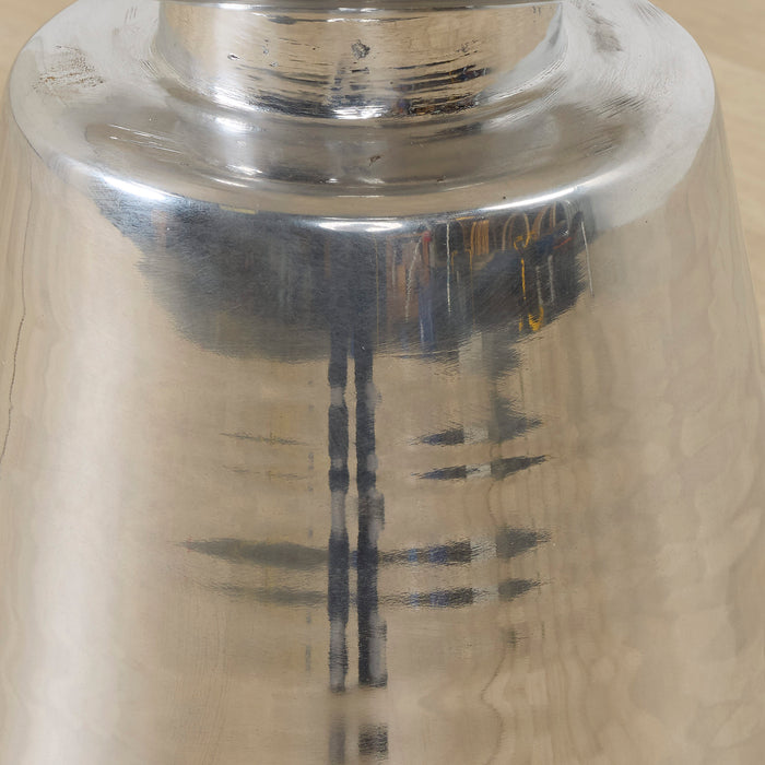 Obelisk Side Table - Chrome, close-up of the sculptural polished chrome surface with reflective finish