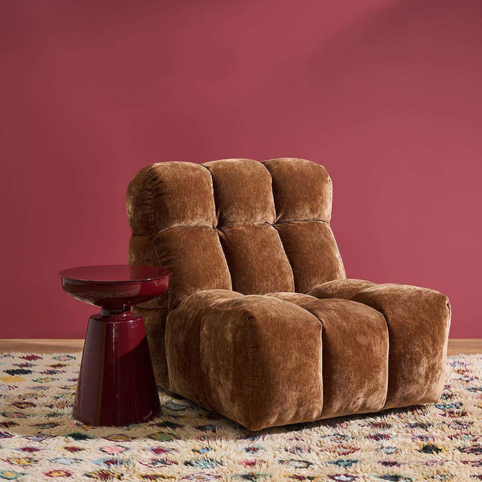 Obelisk Side Table - Wine, sculptural wine side table beside a plush brown armchair on a patterned rug