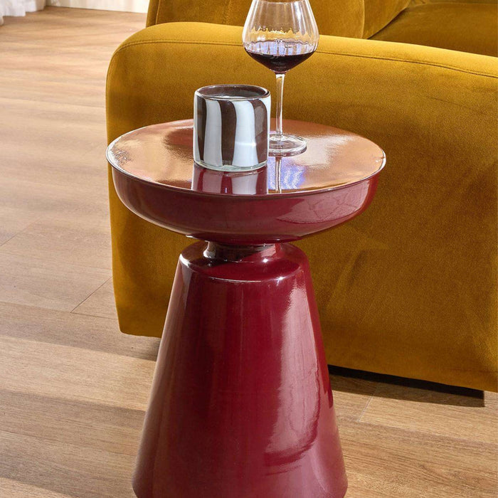 Obelisk Side Table - Wine, glossy sculptural side table with round tray top styled beside a mustard armchair