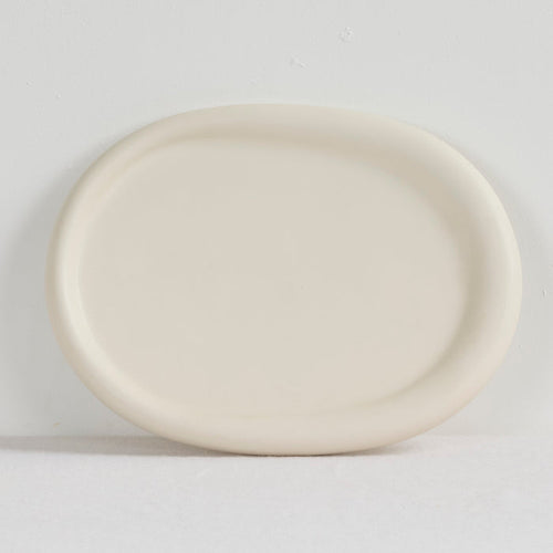 Pebble Large Tray - Bone oval bone-coloured serving tray with a softly rounded raised rim.