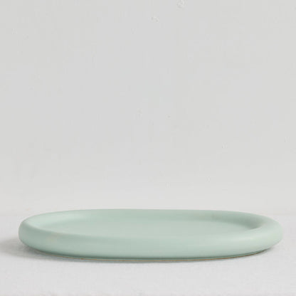 Pebble Large Tray - Sage shallow sage green oval serveware tray with a softly rounded raised rim.