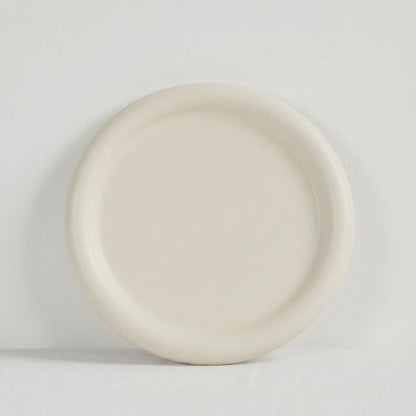Pebble Medium Tray - Bone, round bone-coloured tray with a softly raised rim and organic form