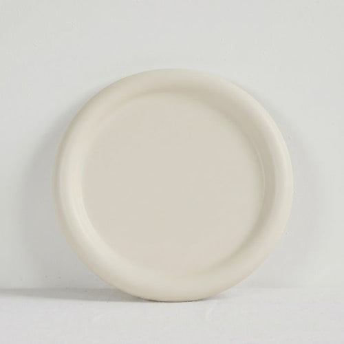Pebble Medium Tray - Bone, round bone-coloured tray with a softly raised rim and organic form