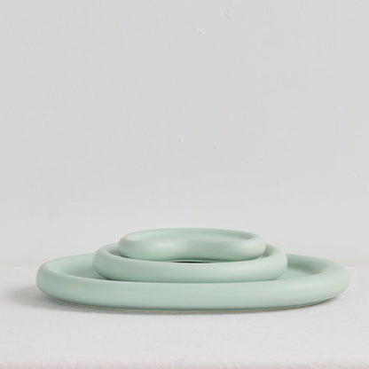 Pebble Medium Tray - Sage, soft sage green organic tray styled with two coordinating pebble-shaped trays