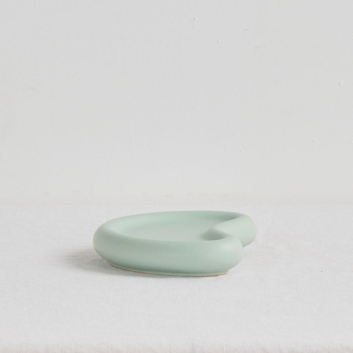 Pebble Small Tray - Sage, sculptural sage green food-safe tray with a smooth matte finish and organic curved form