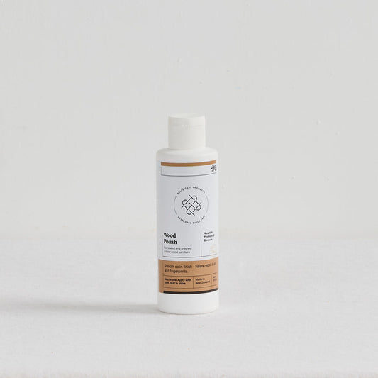 Pelle Wood Polish - 250ml nourishing cream for finished indoor wood in a white bottle with satin finish label