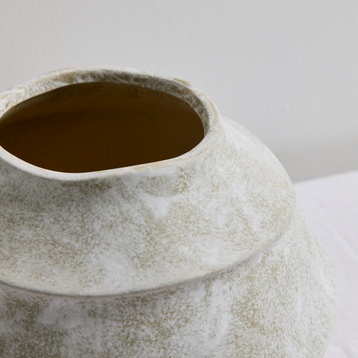 Sculptural Medium Ornament - Cement, close-up of the rounded tiered home decor ornament with a handcrafted textured finish