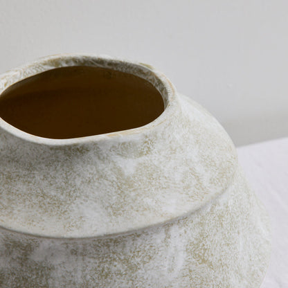 Sculptural Medium Ornament - Cement, close-up of the rounded tiered home decor ornament with a handcrafted textured finish