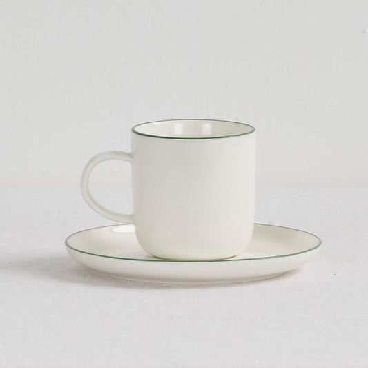 Soma Coffee Cup & Saucer - White/Green white dinnerware set with fine green rim detailing and rounded handle.
