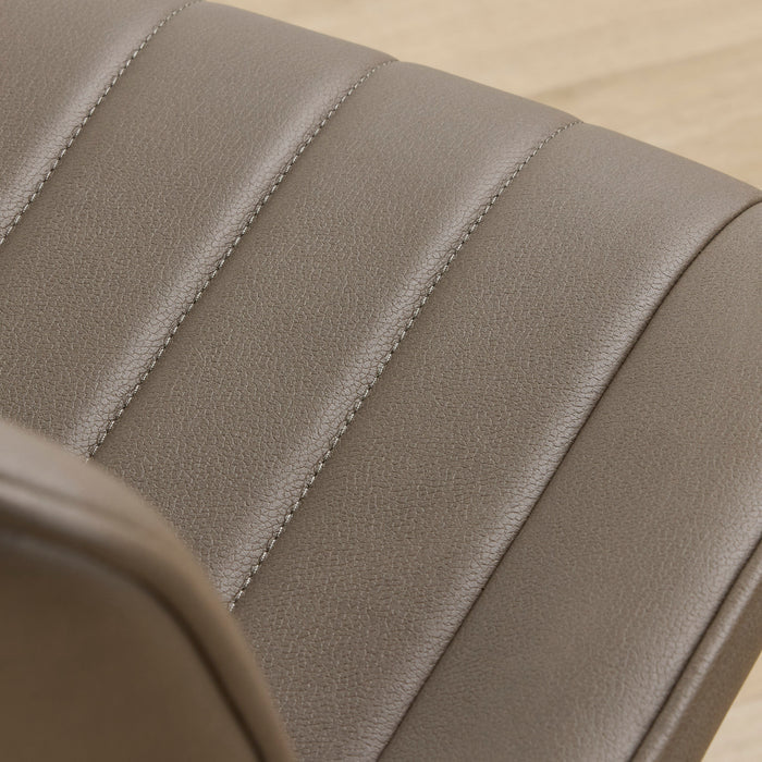 Close-up of a taupe leather or faux leather upholstered chair back, showing vertical channel stitching and a pebbled texture.