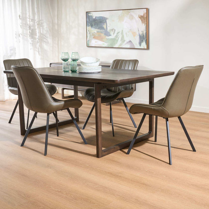 A modern dining room set featuring a rectangular dark wood table surrounded by four upholstered dining chairs in taupe-brown with black metal legs, set on a light wood floor.