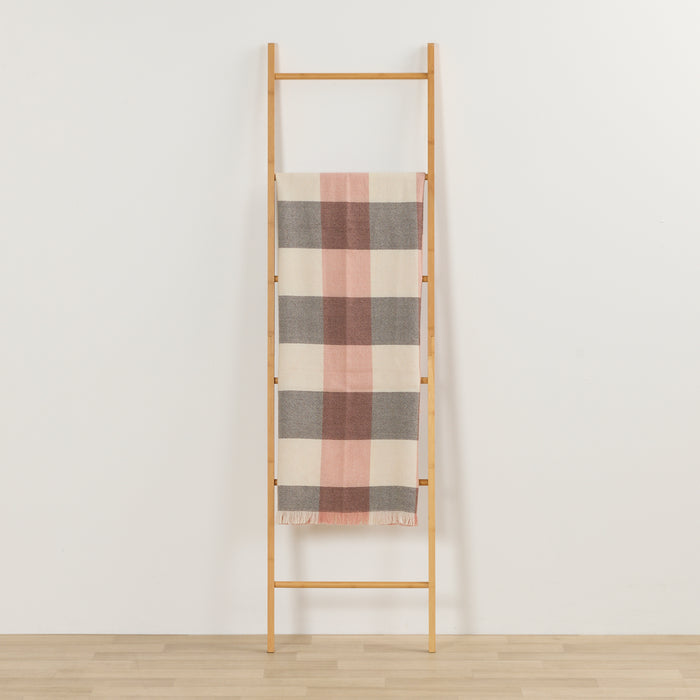 Tara Throw - Choco/Pink checked throw in chocolate, pink and cream draped over a timber ladder.