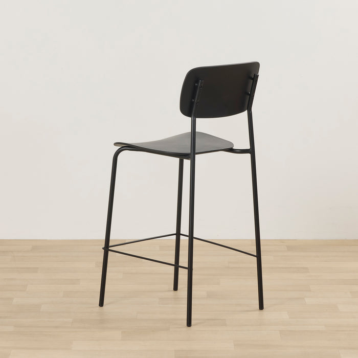 Vincent Counter Stool - Black, rear view of minimalist black counter stool with curved backrest and slim metal frame.
