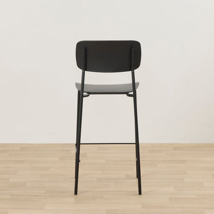 Vincent Counter Stool - Black rear view with curved backrest, slim metal legs and footrest.