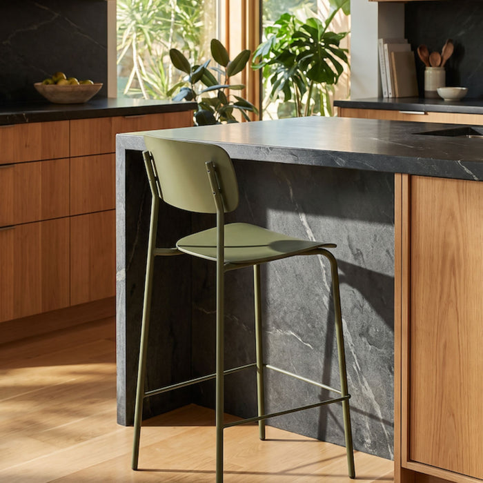 Vincent Counter Stool - Olive with curved backrest, streamlined seat, slender metal legs and footrest.