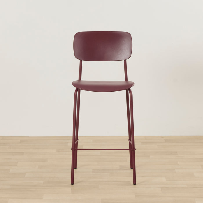 Vincent Counter Stool - Wine, minimalist wine-coloured counter stool with curved backrest, slim metal frame and footrest.