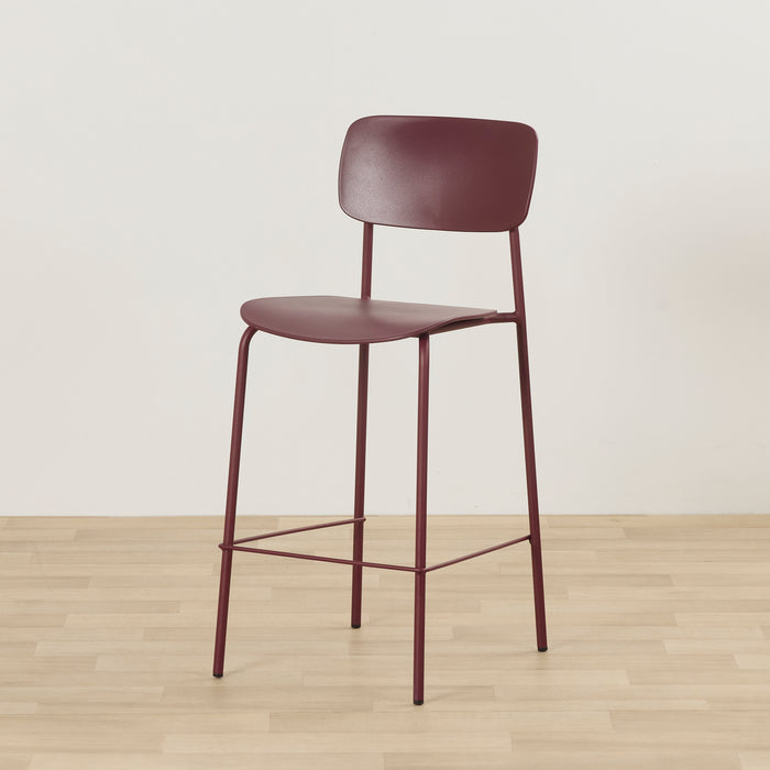 Vincent Counter Stool - Wine, minimalist wine-coloured counter stool with curved backrest, slim metal frame and footrest.