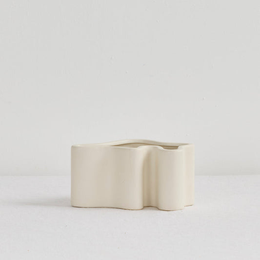 Wave Low Vase - Bone, low sculptural bone ceramic vase with softly undulating curves and an organic wavy opening