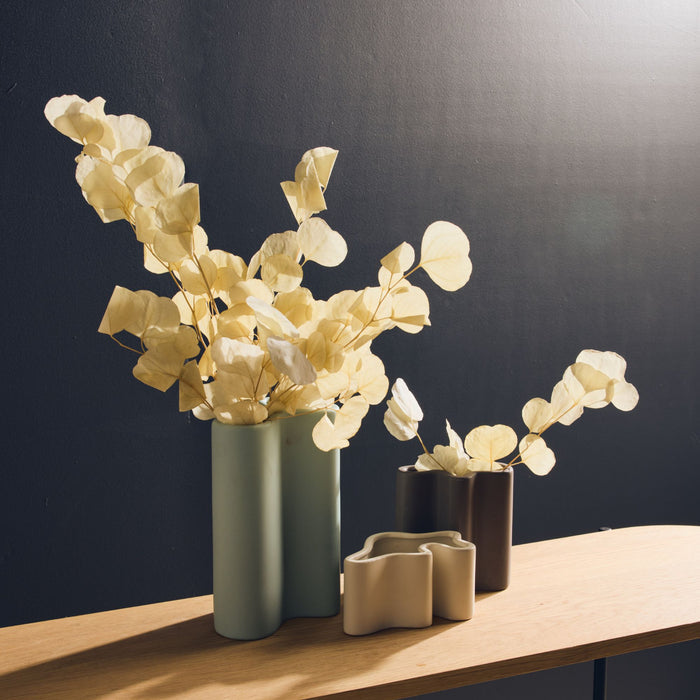 Wave Tall Vase - Sage, softly curved tall sage green vase styled with dried foliage on a timber console table